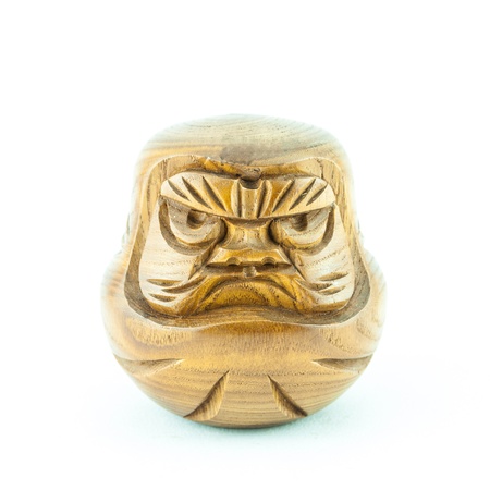 angry wooden dol - wooden doll on a white backgroundの写真素材
