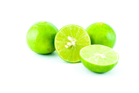 Green fresh lime and slice, Isolated on white background - Fresh limes Isolated on white