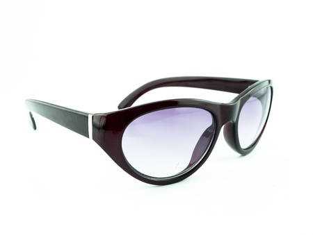 Purple sunglasses isolated on the white background - Teenage Sunglasses isolated against a white backgroundの写真素材
