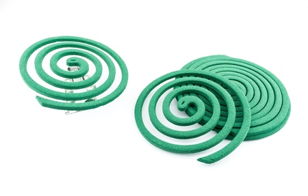 mosquito coil -  Anti mosquito green color - insecticides, coils - anti mosquito smoke spiral isolated on the white backgroundの写真素材