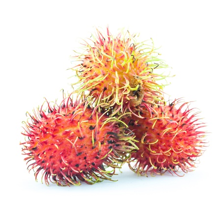 Rambutan is a fruit with sweet red shell - Fresh rambutan sweet delicious fruit - Rambutan fruit isolated on white backgroundの写真素材