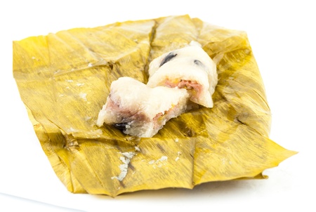 Thai dessert sticky rice with banana isolated on white backgroundの写真素材