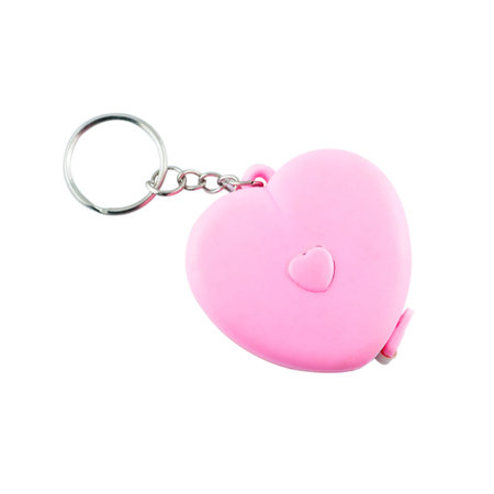 Plasstic Trinket for the keys as a heart, isolated on white