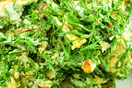 Scrambled eggs with herbs  Vegetable Omelet on whiteの写真素材