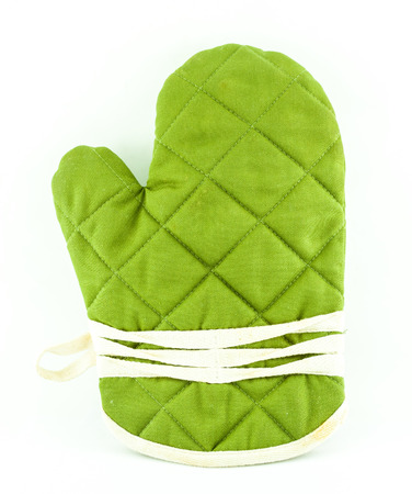 Green tableware or Kitchen glove isolated on whiteの写真素材