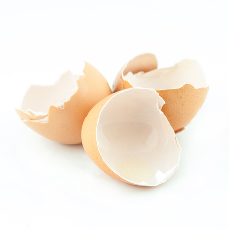 broken eggshell isolated on white backgroundの写真素材