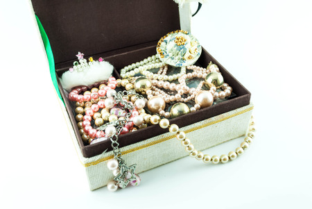 jewelry box with jewelry  - Treasure of pearls on whiteの写真素材