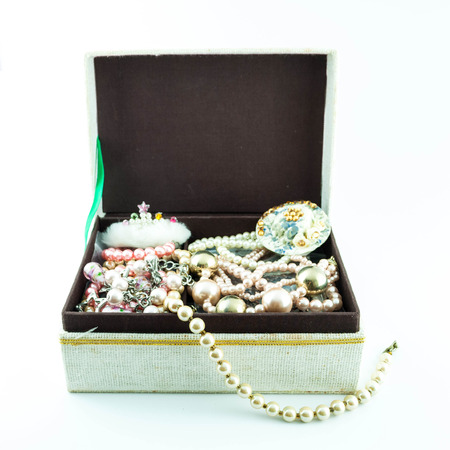 jewelry box with jewelry  - Treasure of pearls on whiteの写真素材