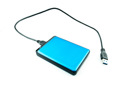 hard disk with wire isolated on a white backgroundの写真素材