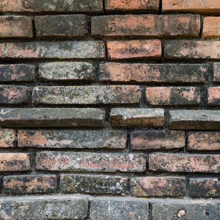 Vintage dirty of red brick wall texture grunge backgroundの写真素材
