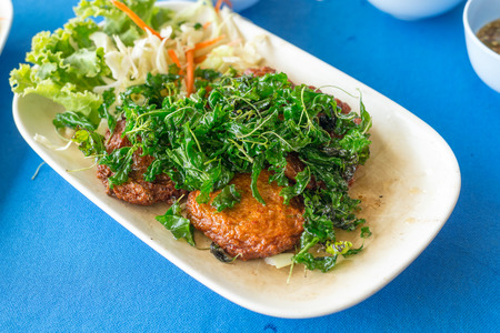 Thai Food Fish Cake (Tod Mun Pla) and Fried Vegetableの写真素材