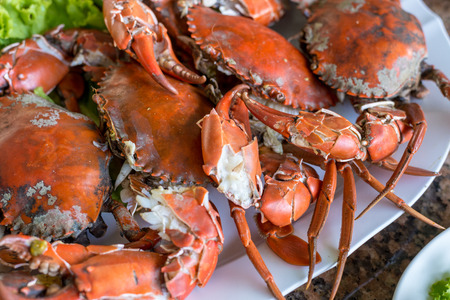 Hot steamed red crab prepare to eat on a plateの写真素材