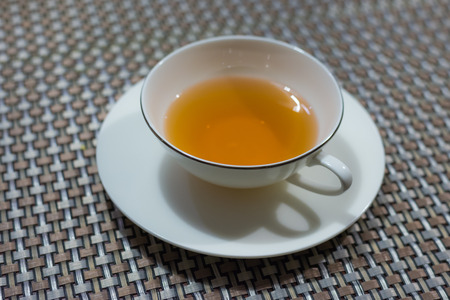 Cup of black tea on the table の写真素材