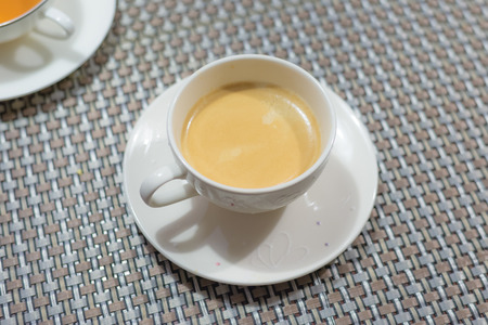 Cup of coffee on the table の写真素材