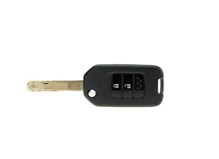 Remote control and car key isolated on white backgroundの写真素材