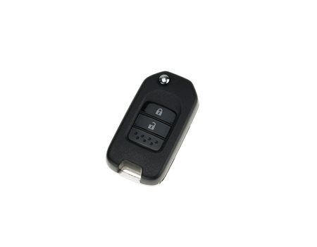 Remote control and car key isolated on white backgroundの写真素材