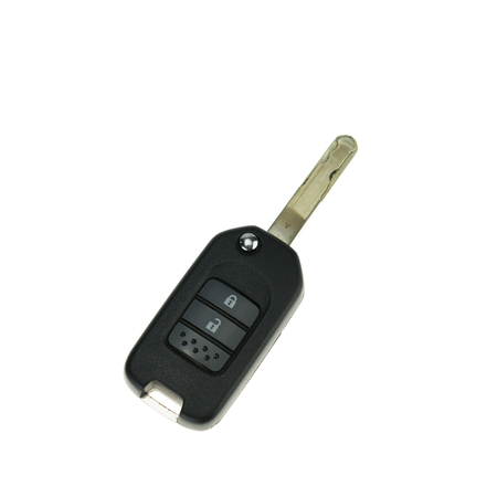 Remote control and car key isolated on white backgroundの写真素材