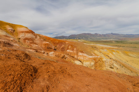 Red mountains in Kyzyl-Chin valley in Altay. Scenic landscape. Summer concept.