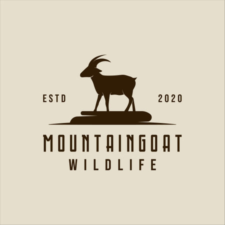 mountain goat logo vintage vector illustration template icon graphic design. animal in wildlife sign or symbol for livestock ranch conceptのイラスト素材