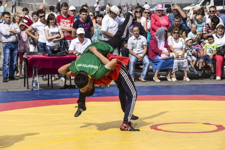 Ufa Republic Of Bashkortostan. Russia. Open tournament on wrestling kuresh Cup of the head of the city Administration , devoted to the city Day.  	
Kuresh - traditional sport of the Turkic peoples, national wrestling on belts.
のeditorial素材