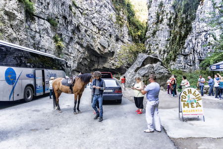Abkhazia, tourists relax in the Parking lot in the valley of the mountains.のeditorial素材