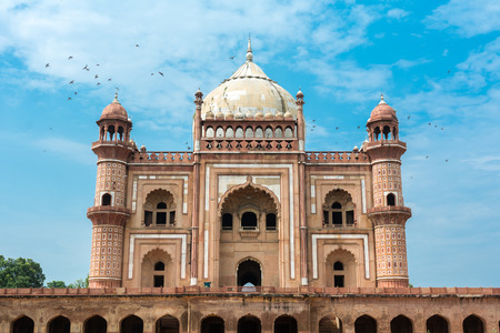 Birds flying over Safdar Jung's Tomb in New Dehli, Indiaのeditorial素材