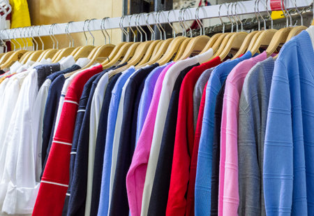 Women colorful blouses in row for sale at the department stores