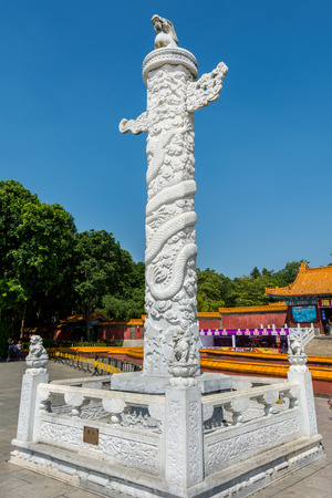 Ancient chinese marble pillar with dragon carvings in Huabiao, Chinaのeditorial素材