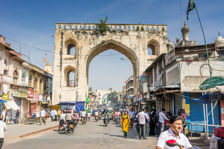 Hyderabad City, Andhra Pradesh, India- November 18, 2016: Street of Hyderabad City with background of ancient Indian Mugul style buildingのeditorial素材