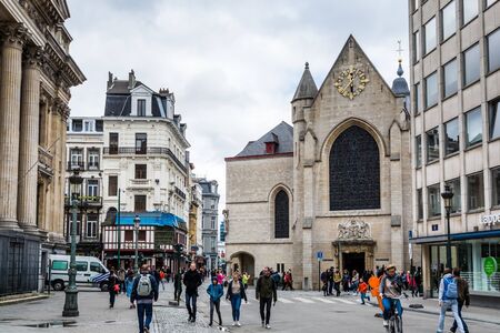 Street view of old downtown with lots of people walking at the street of Brussels, Belgium.のeditorial素材