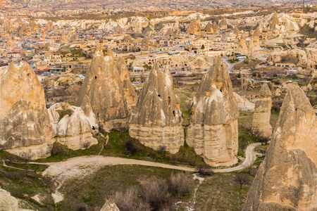Aerial view of colorful rocks and Cave hotel in the valley of Goreme under twilight, built in rock formation in national park Goreme,Cappadocia ,Turkey.のeditorial素材