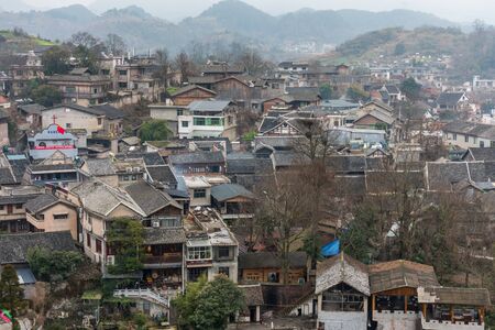 Ming Qing Dynasty Chinese traditional rural house, built with black tiles, stone, and bricks, in Qingyan Ancient town, one of famous old town and popular travel destination in Guiyang, Guizhou Province, China.のeditorial素材