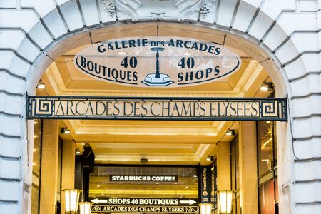 Street view of Champs-Elysees Avenue with shopping malls in Paris, Franceのeditorial素材