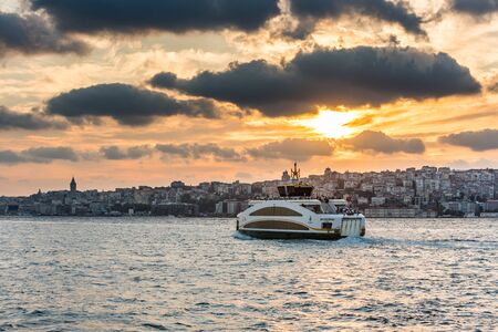 A cruise ship crossing the Bosphorus Strait of Istanbul of Turkey, part of the continental boundary between Europe and Asia,のeditorial素材