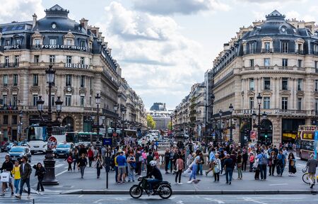 Street view of downtown with historic building and lots of people in the street, in Paris Franceのeditorial素材