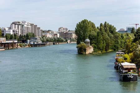 Beutiful view of Seine River with island, cruise ships and buildings, Paris, France.のeditorial素材
