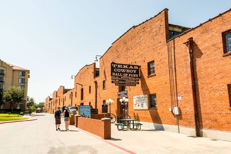 Street view with historic buildings at the Fort Worth Stockyards, a historic district that is located in Fort Worth, Texas, USA.のeditorial素材