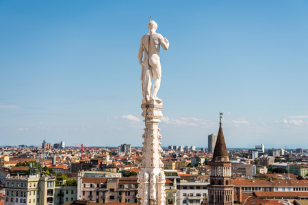 Architectural details with statues on the top of beautiful building of the Milan Cathedral (Duomo di Milano), the cathedral church of Milan, Lombardy, Italy. Dedicated to the Nativity of St Mary.のeditorial素材