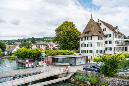 Cruise ship dock at the Lake of Zurich with background of buldings at the lakeshore in Zurich, Switzerland.のeditorial素材