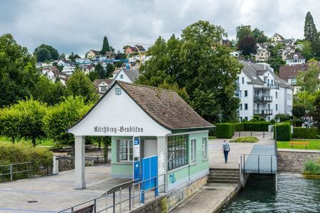 Cruise ship dock at the Lake of Zurich with background of buldings at the lakeshore in Zurich, Switzerland.のeditorial素材