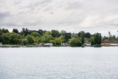 Beautiful buildings on the hills and on the lakeshore of Lake of Zurich, Switzerland.の写真素材