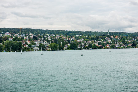 Beautiful buildings on the hills and on the lakeshore of Lake of Zurich, Switzerland.