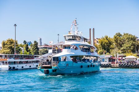 A tourists cruise ship sailing on the Bosphorus Strait of Istanbul of Turkey, part of the continental boundary between Europe and Asiaのeditorial素材