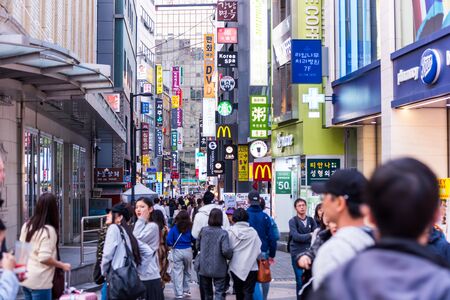 Myeongdong Shopping Street, one of Seoul's main shopping, parade route and tourism districts in Seoul, South Korea.のeditorial素材