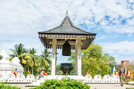 Buildings with a bell inside of the complex of Sri Dalada Maligawa or the Temple of the Sacred Tooth Relic, a Buddhist temple in Kandy, Sri Lanka. which houses the relic of the tooth of the Buddha.のeditorial素材