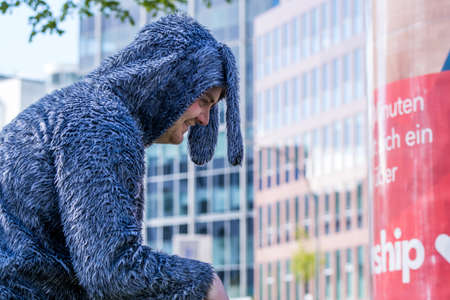 A man wearing rabbit costume ready for performance at the street in Hamburg, Germany.のeditorial素材