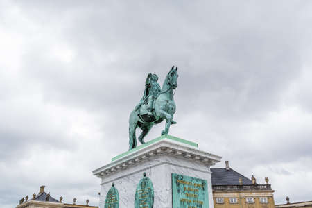 A monumental equestrian statue of Amalienborg's founder, King Frederick V. in the  Amalienborg, the home of the Danish royal family, and is located in Copenhagen, Denmark.のeditorial素材