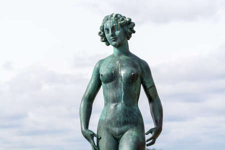 Statues Dansen, The Dance,  by Carl Eldh in front of old town (Gamla Stan), Stockholm, Swedenのeditorial素材