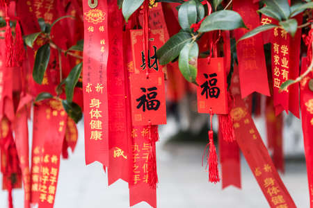 Red lucky charms hanging in Confucius temple in Nanjing City, Jiangsu Province, China, a temple for the veneration of Confucius and the sages and philosophers of Confucianism in Chineseのeditorial素材