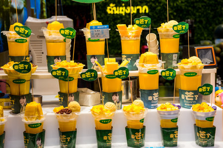 Mango juice shops at the bank of Qinhuai River in Nanjing City, Jiangsu Province, China.